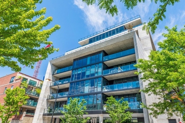 111 South Peoria Street, Unit 503 Chicago, IL 60607 - Photo 1 of 29 a view of a building with a tree