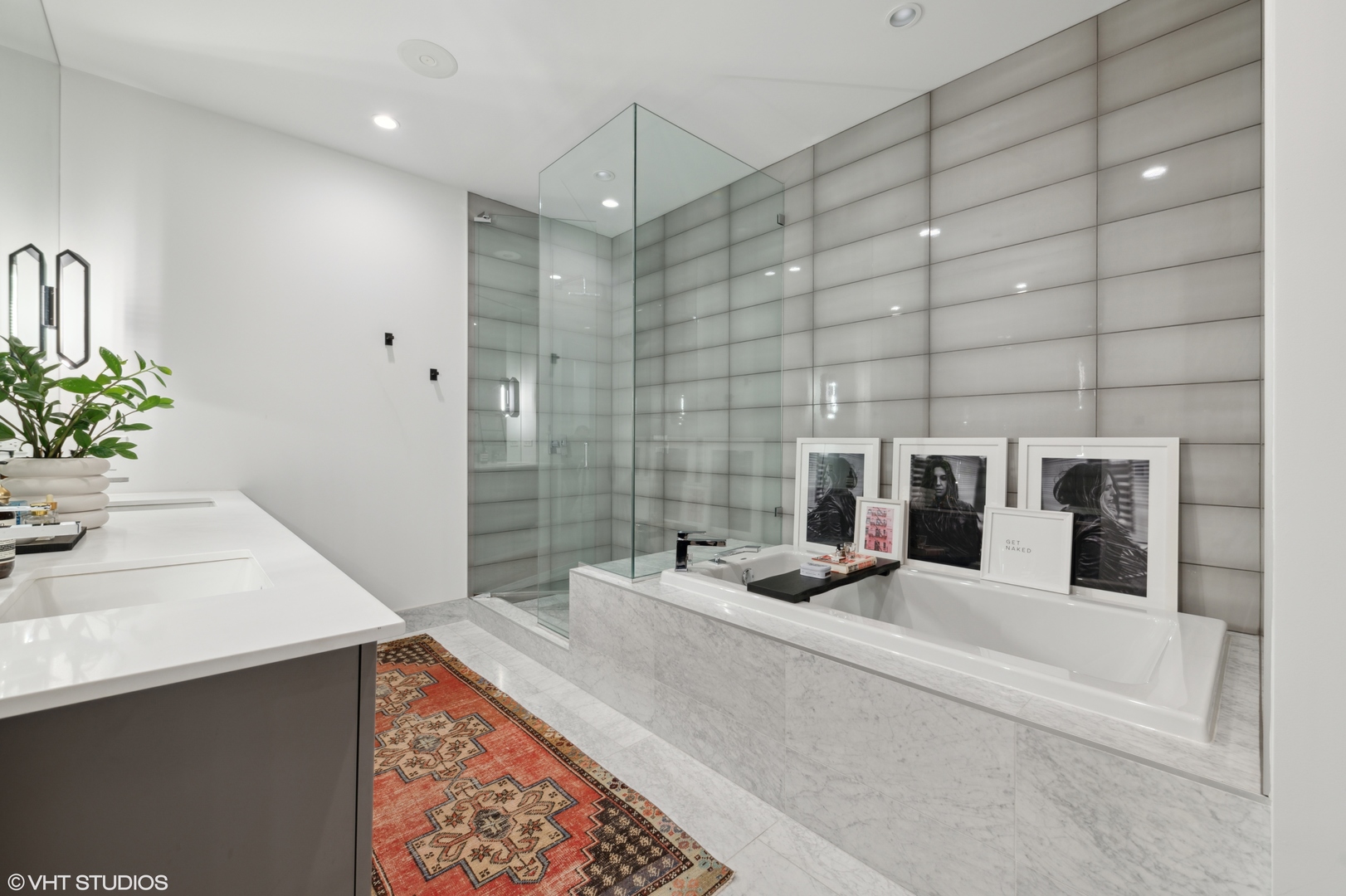 111 South Peoria Street, Unit 503 Chicago, IL 60607 - Photo 19 of 29 a bathroom with a sink and a mirror