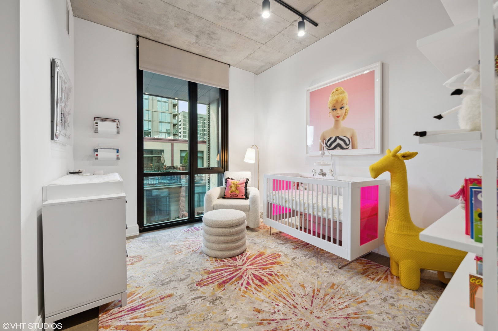 111 South Peoria Street, Unit 503 Chicago, IL 60607 - Photo 22 of 29 a living room with baby crib furniture and a window