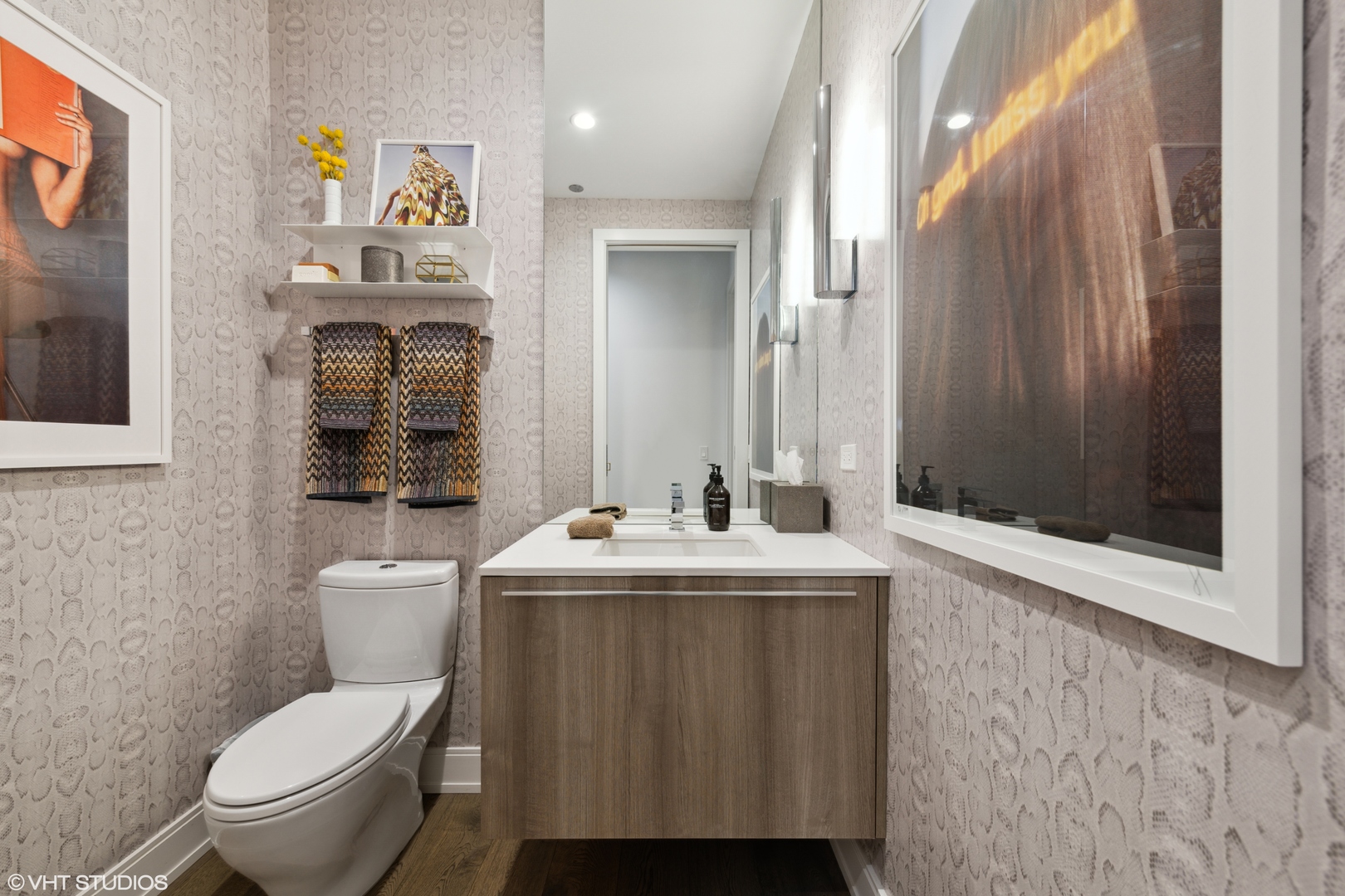 111 South Peoria Street, Unit 503 Chicago, IL 60607 - Photo 26 of 29 a bathroom with a toilet a sink and mirror