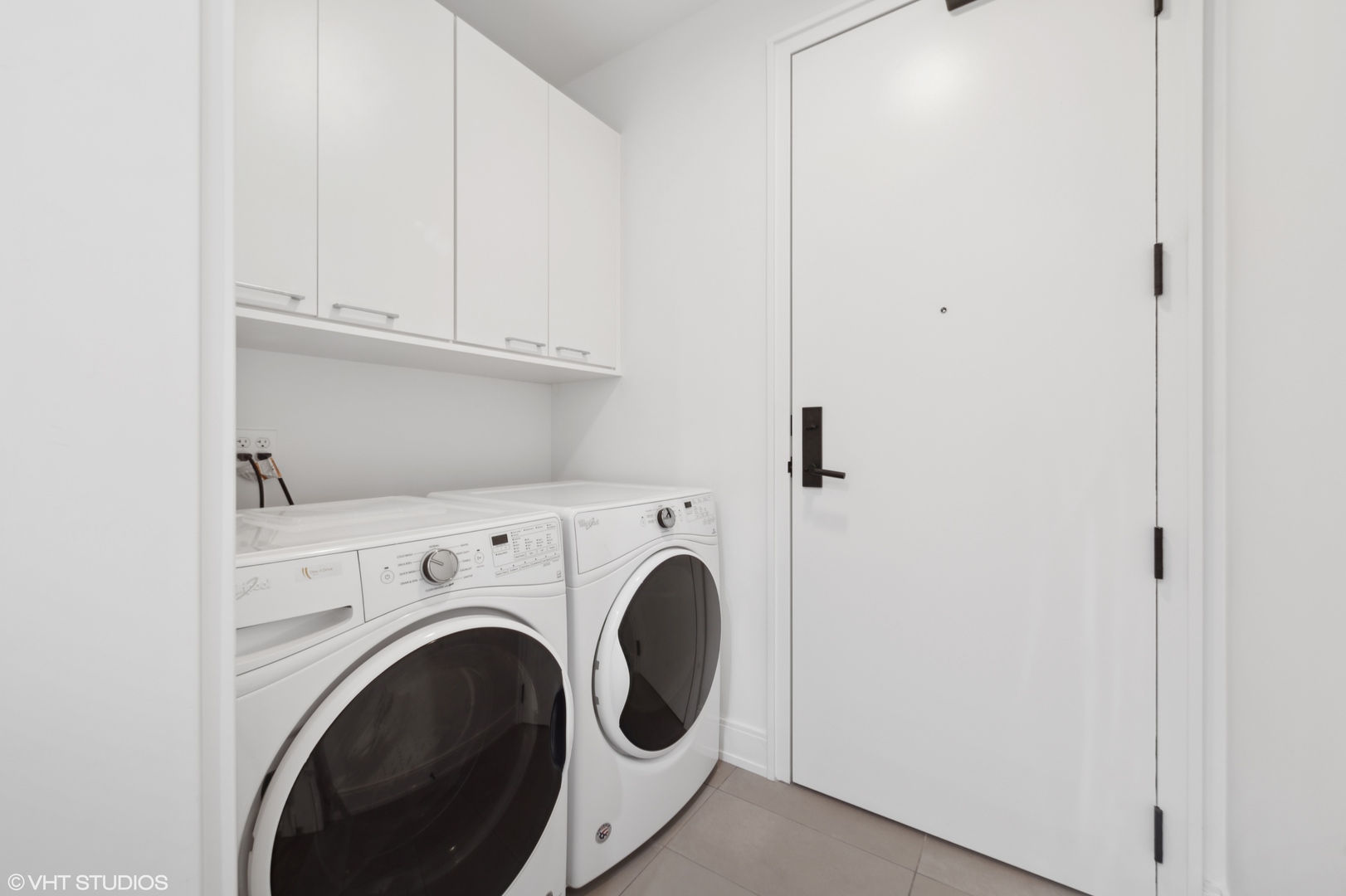 111 South Peoria Street, Unit 503 Chicago, IL 60607 - Photo 29 of 29 a utility room with dryer and washer