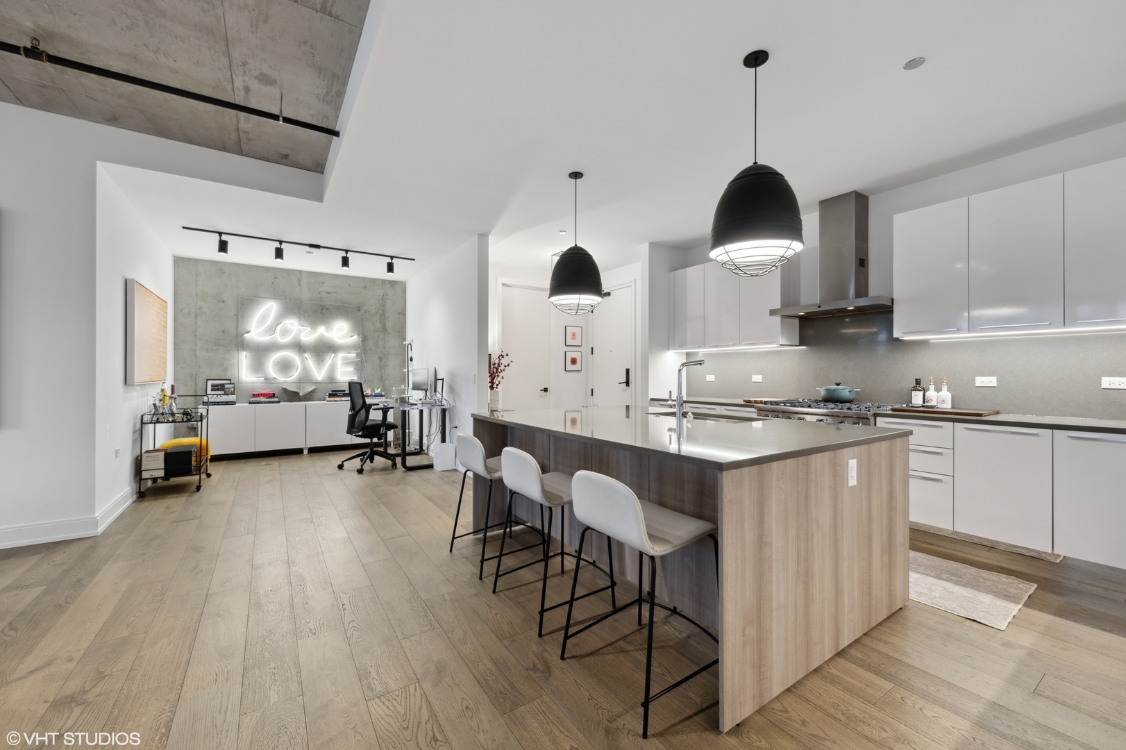 111 South Peoria Street, Unit 503 Chicago, IL 60607 - Photo 4 of 29 a view of open kitchen with furniture and window