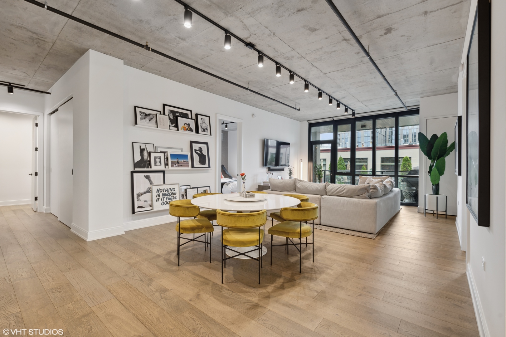 111 South Peoria Street, Unit 503 Chicago, IL 60607 - Photo 10 of 29 a view of a livingroom with furniture and window
