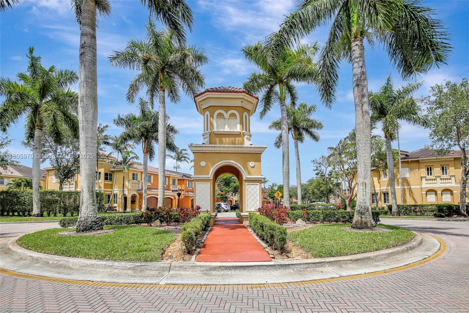 8999 Southwest 18th Street, Unit 1401 Miramar, FL 33025 - Photo 11 of 51 a front view of a house with garden