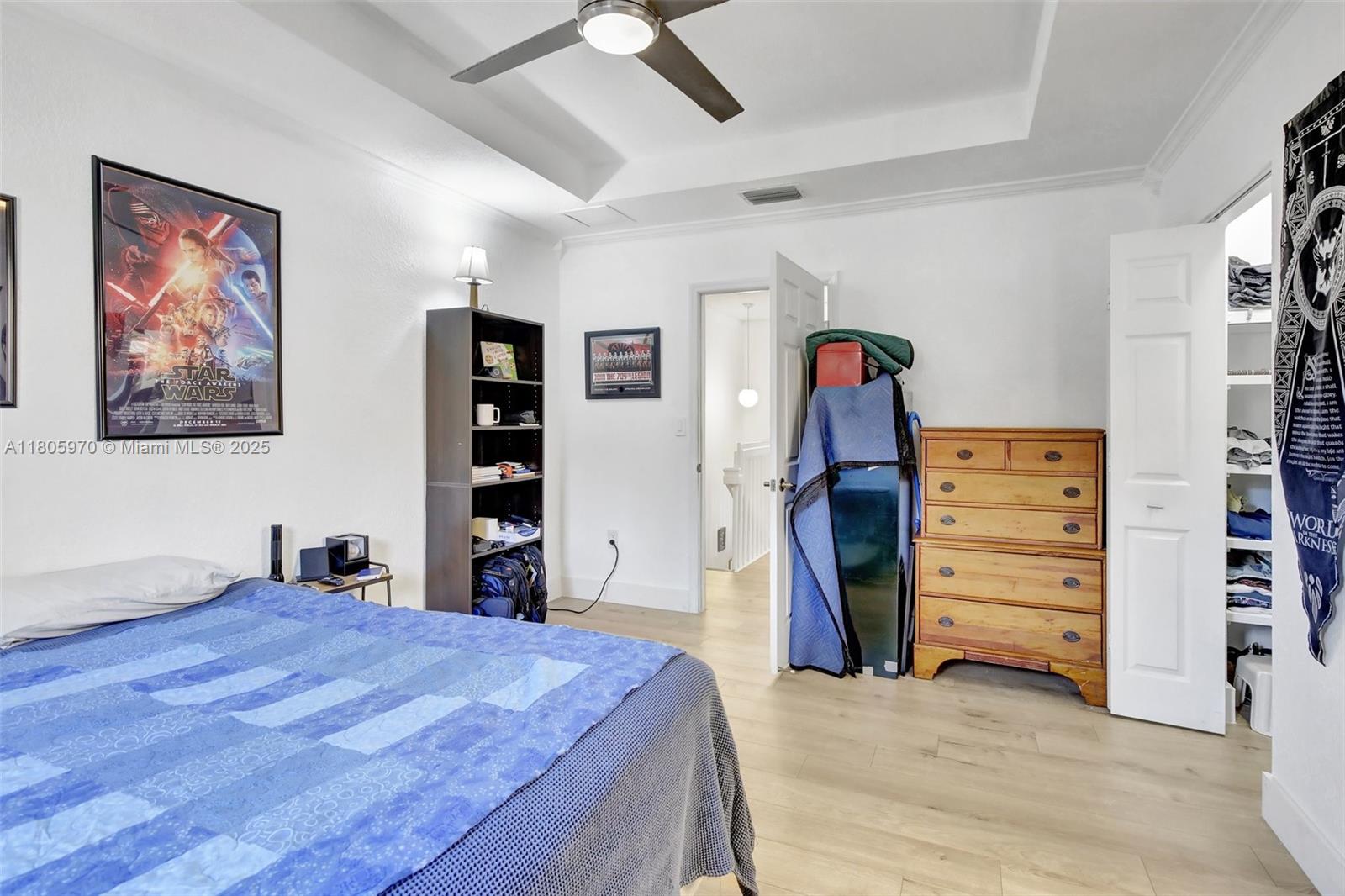 8999 Southwest 18th Street, Unit 1401 Miramar, FL 33025 - Photo 27 of 51 a bedroom with a bed and a closet