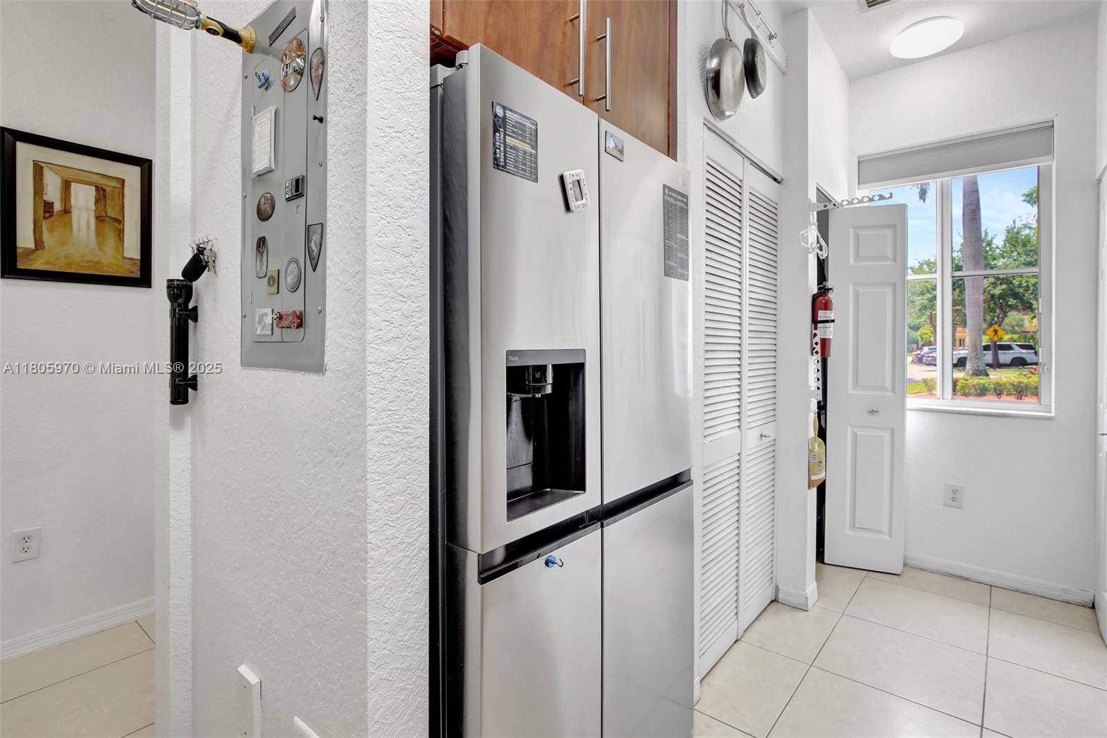 8999 Southwest 18th Street, Unit 1401 Miramar, FL 33025 - Photo 40 of 51 a view of a hallway with windows and entryway