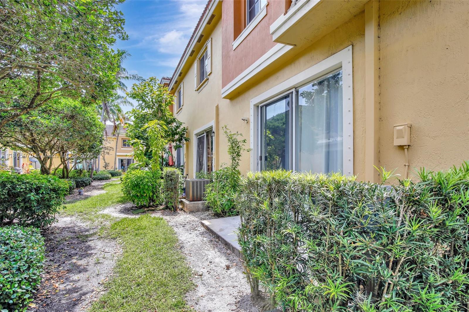 8999 Southwest 18th Street, Unit 1401 Miramar, FL 33025 - Photo 8 of 51 front view of a house