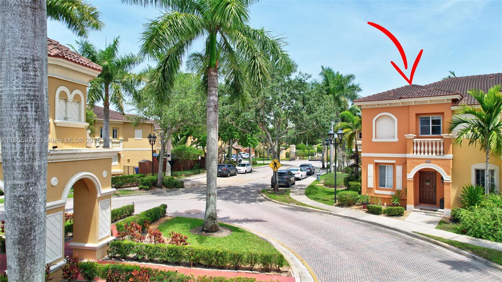 8999 Southwest 18th Street, Unit 1401 Miramar, FL 33025 - Photo 9 of 51 a front view of a house with garden