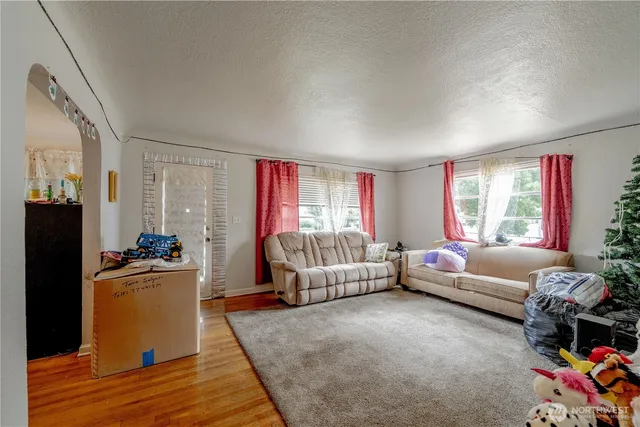 a bathroom with a sink vanity mirror and toilet