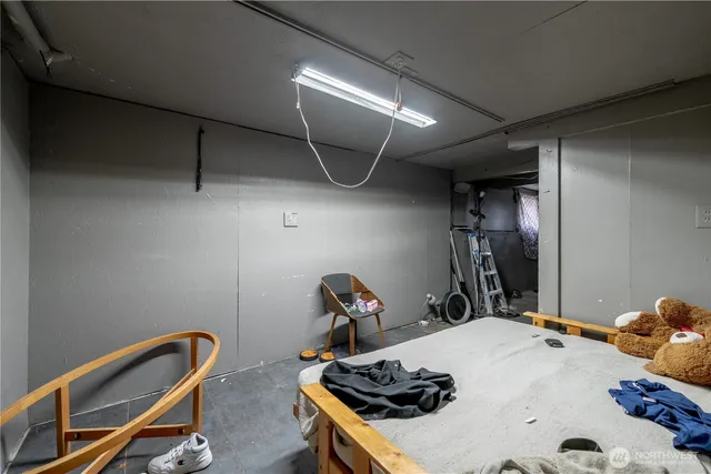 a bed room with a bed and a table