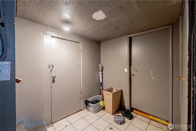 a view of entryway with workspace and stairs