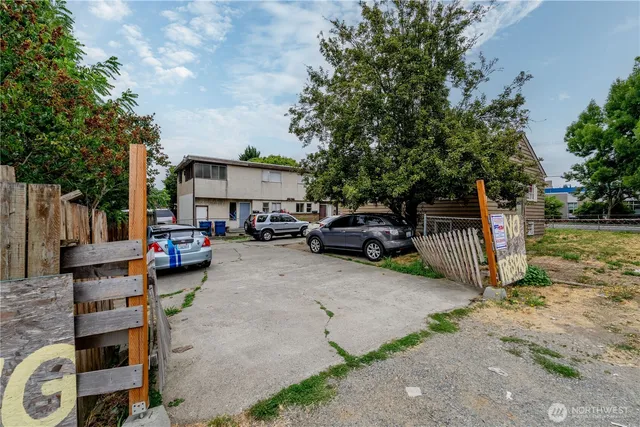 a house view with a garden space
