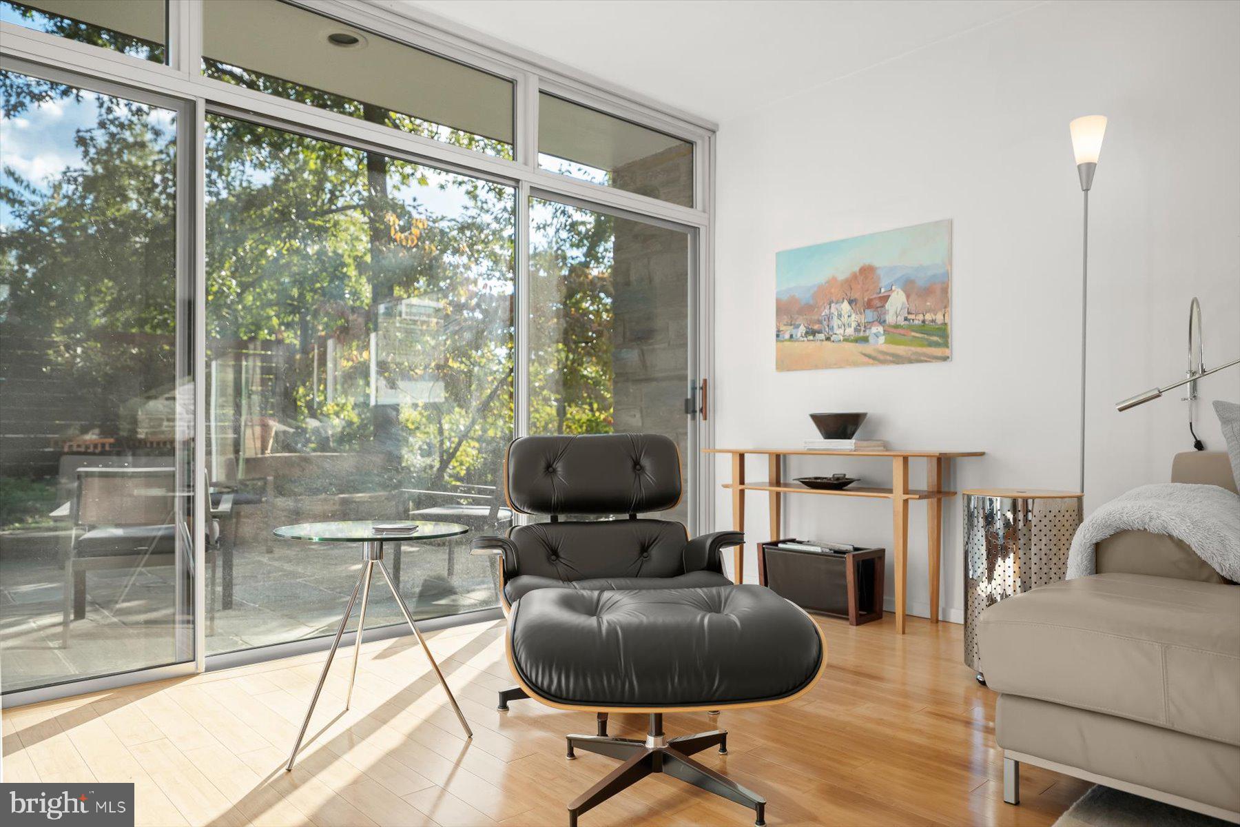 2533 North Ridgeview Road Arlington, VA 22207 - Photo 51 of 93 Two sliders that lead to side patio, pond & grill