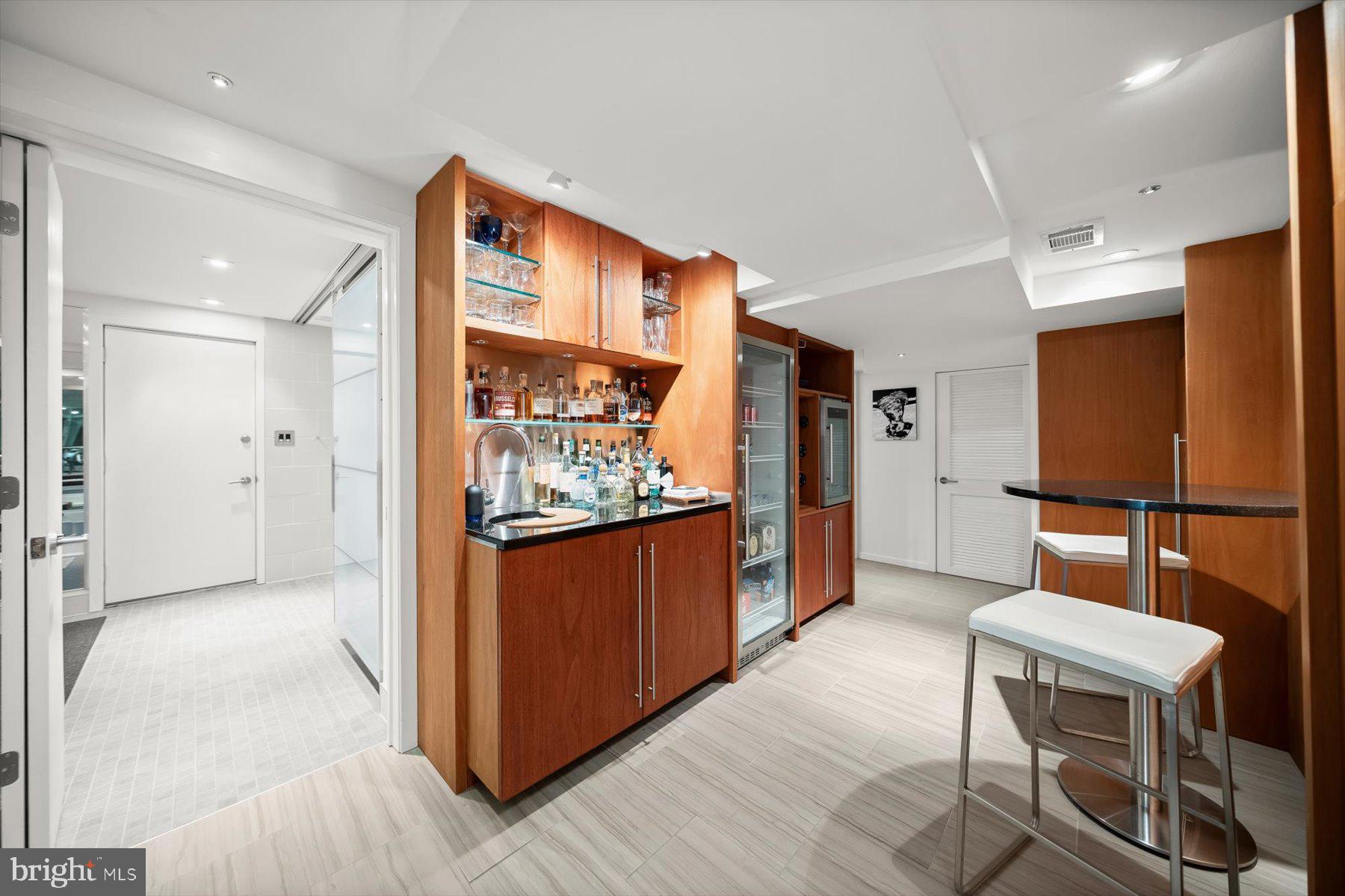 2533 North Ridgeview Road Arlington, VA 22207 - Photo 62 of 93 Built-in bar with sink and storage