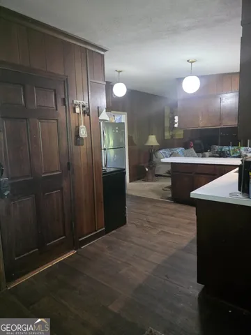 a view of a kitchen and dining room