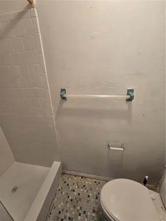 a bathroom with a sink and toilet