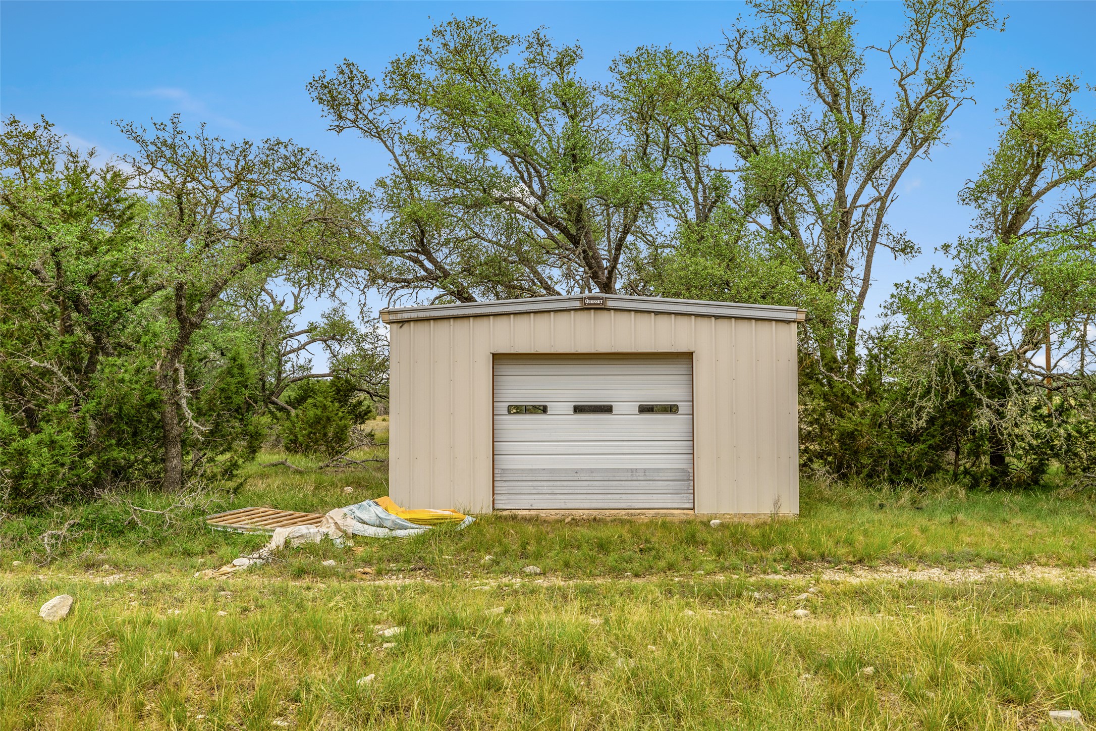 65 Miles Lane Harper, TX 78631 - Photo 14 of 27 a view of a house with a yard