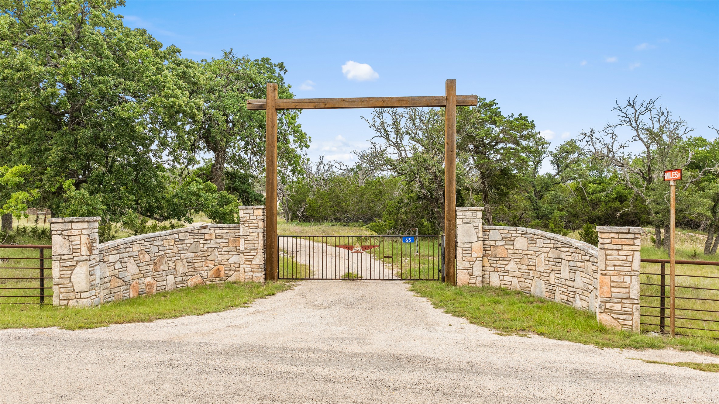 65 Miles Lane Harper, TX 78631 - Photo 25 of 27 a view of a fence in the middle of a yard