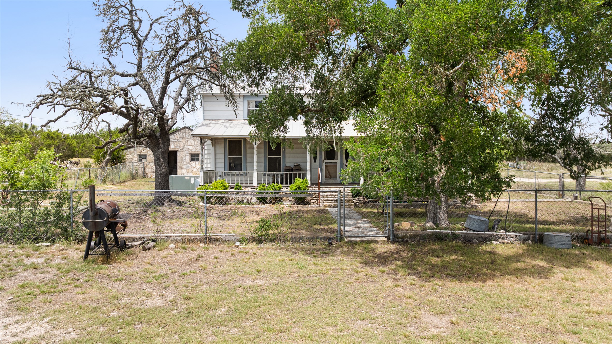 65 Miles Lane Harper, TX 78631 - Photo 26 of 27 a view of a house with swimming pool