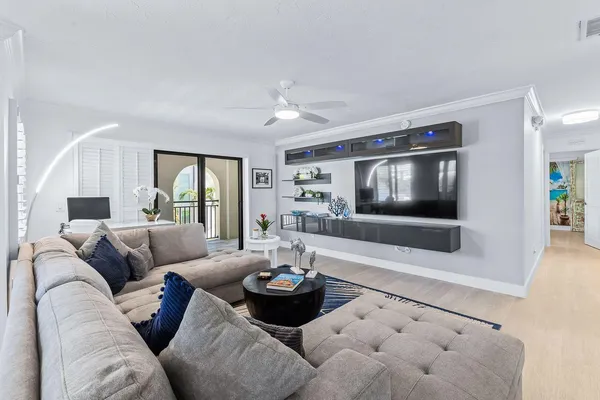 a kitchen with granite countertop kitchen island white cabinets and a granite counter tops