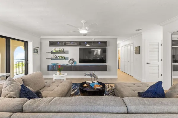 a kitchen with stainless steel appliances granite countertop a stove refrigerator sink and cabinets