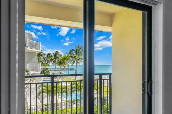 a view of a balcony with an outdoor space