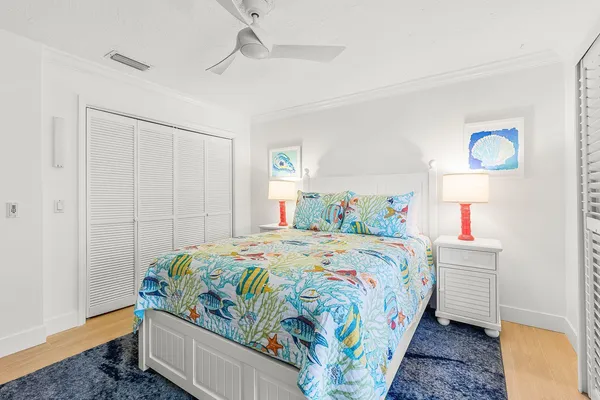a view of swimming pool with outdoor seating and plants