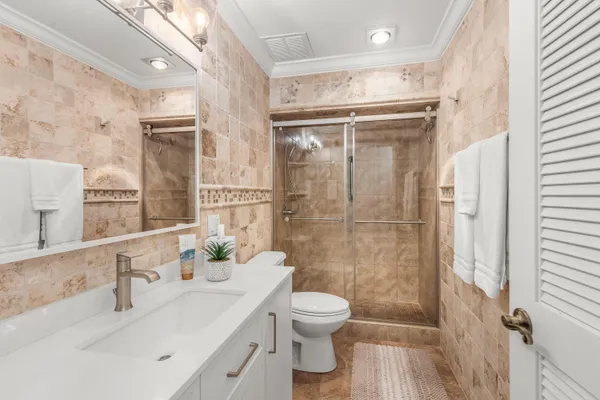 a view of a yard with a house in the background