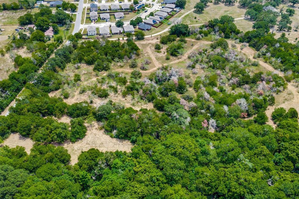 0 West End Terrell, TX 75160 - Photo 3 of 4 an aerial view of residential houses with outdoor space and trees