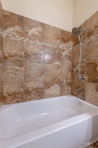 a bathroom with a bathtub