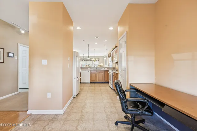 a spacious bedroom with a bed and a couch