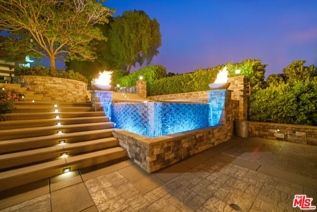 a view of house with a big yard