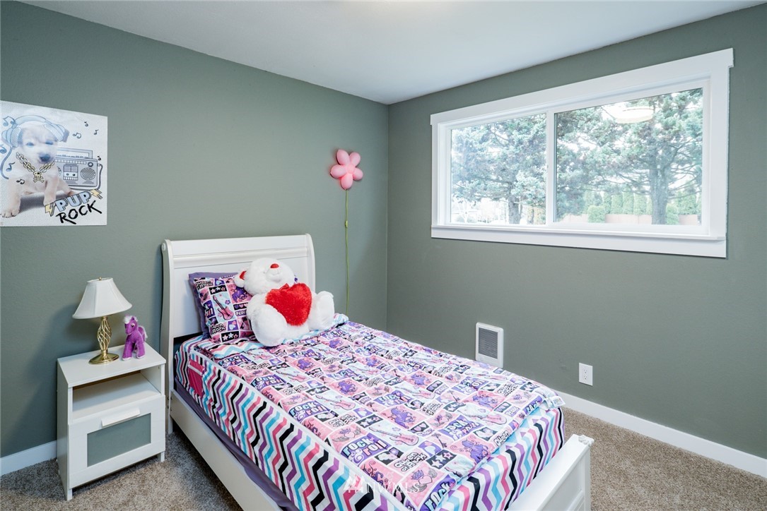 903 Center Road Everett, WA 98204 - Photo 14 of 25 a bedroom with a bed and a window