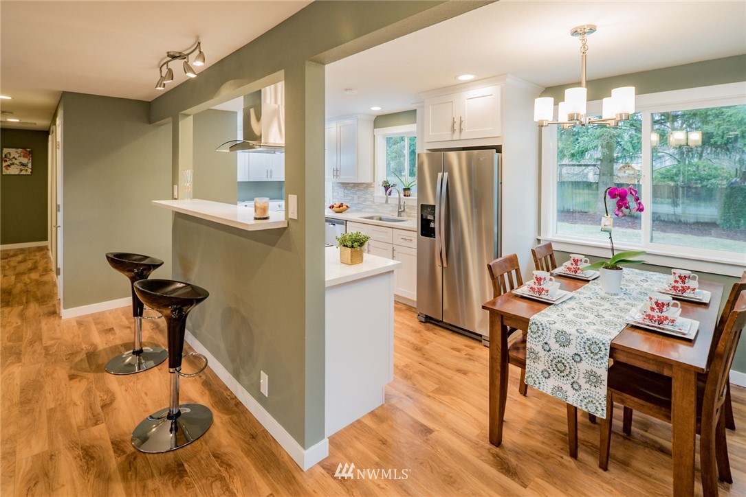 903 Center Road Everett, WA 98204 - Photo 8 of 25 a very nice looking dining room with a table and chairs