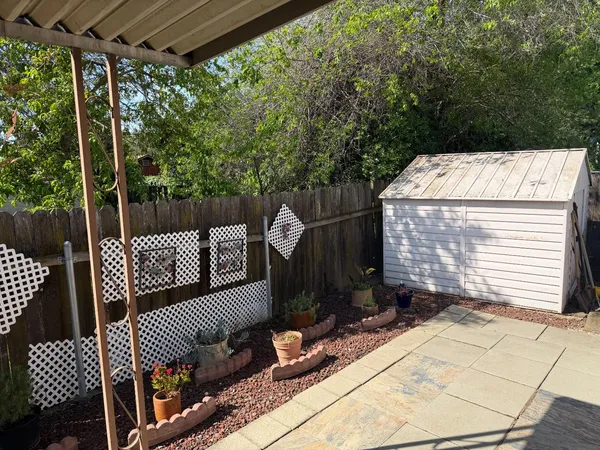 a view of balcony with a patio