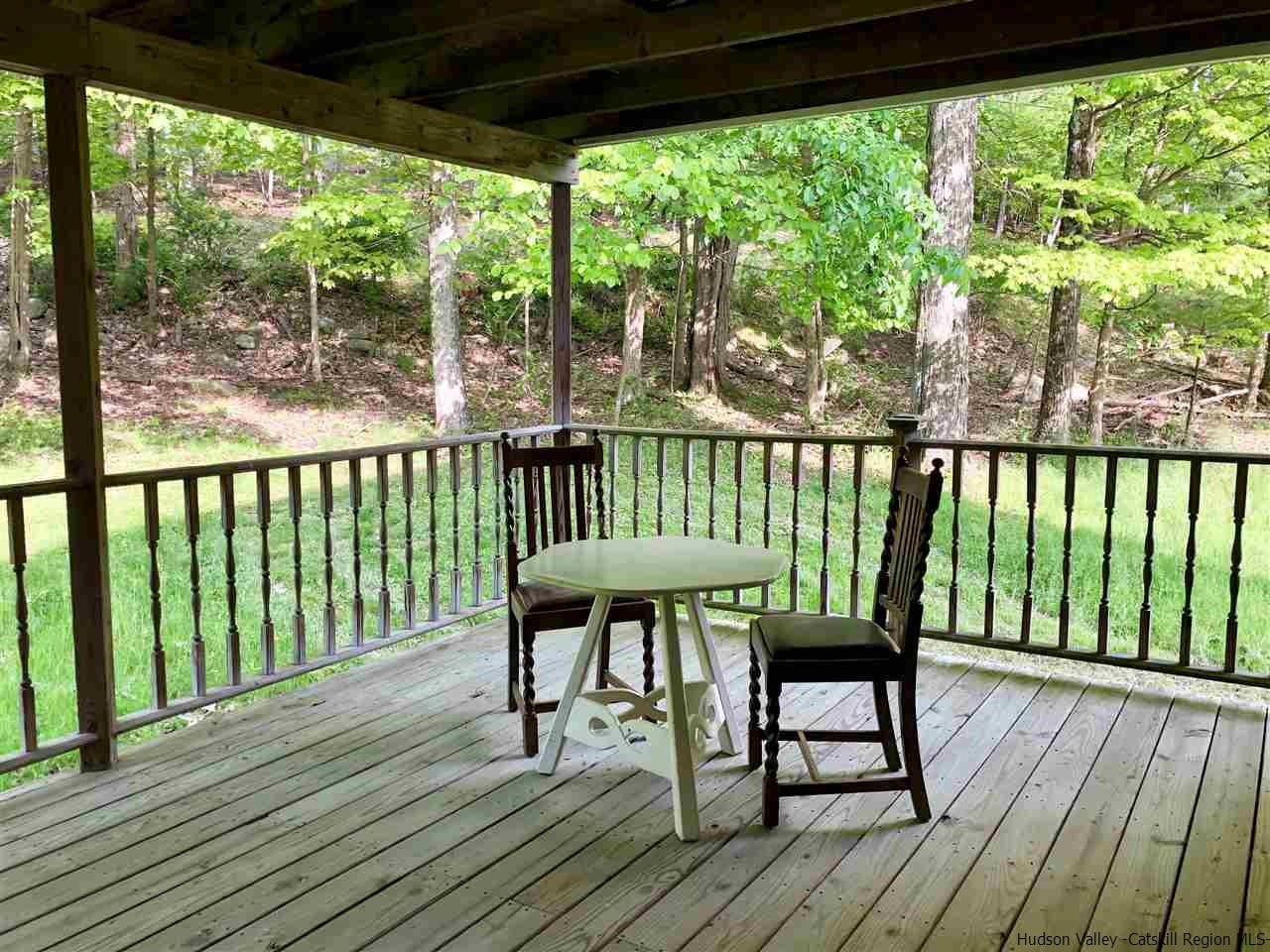 190 Buck Road Stone Ridge, NY 12484 - Photo 12 of 33 a view of a two chairs in the deck