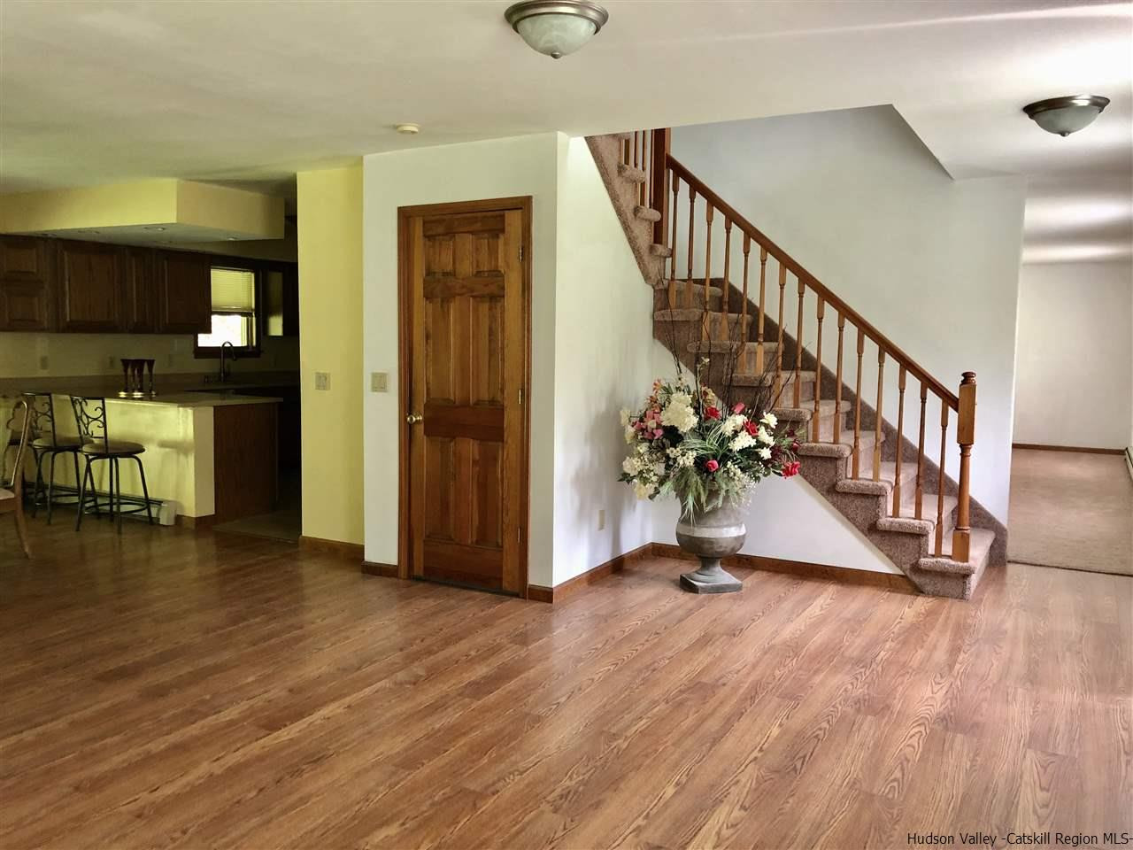 190 Buck Road Stone Ridge, NY 12484 - Photo 13 of 33 a view of an entryway with wooden floor