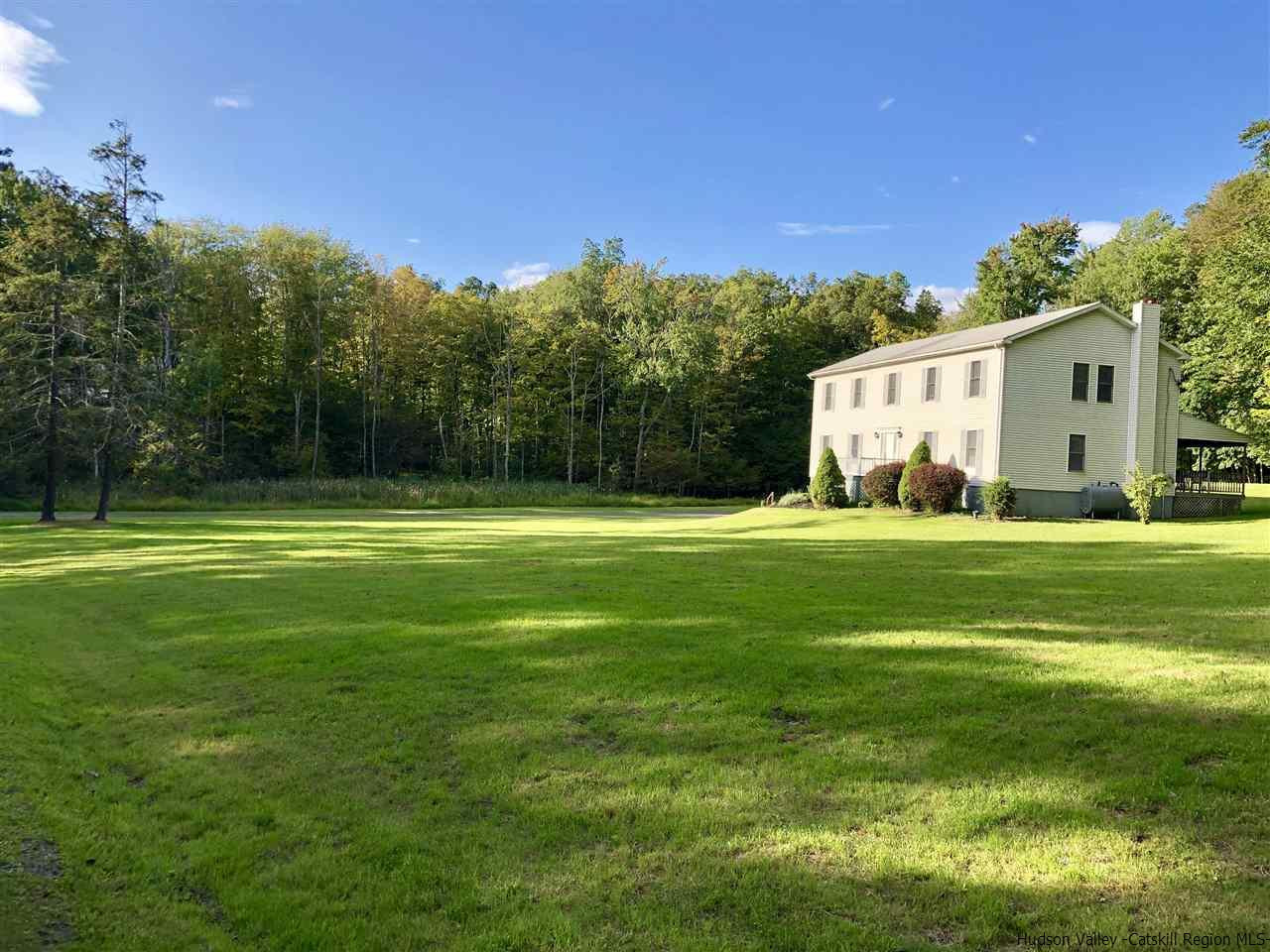 190 Buck Road Stone Ridge, NY 12484 - Photo 29 of 33 a view of a house with a big yard