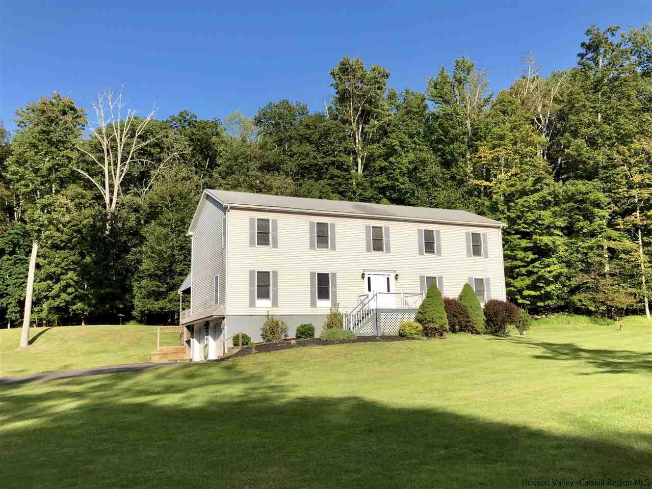 190 Buck Road Stone Ridge, NY 12484 - Photo 32 of 33 a front view of house with yard and trees