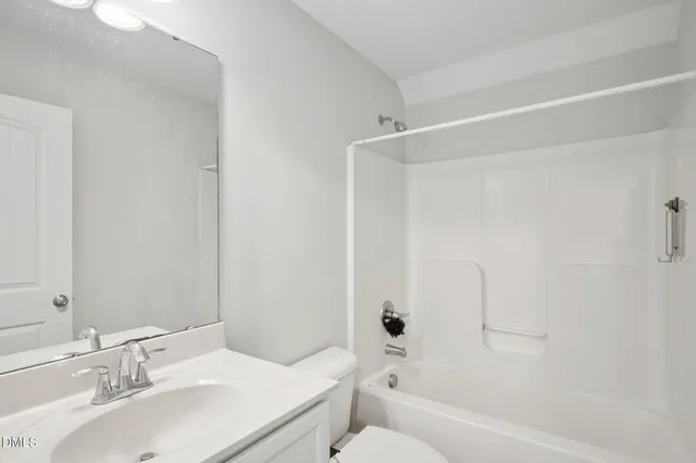 a large white building with a glass door