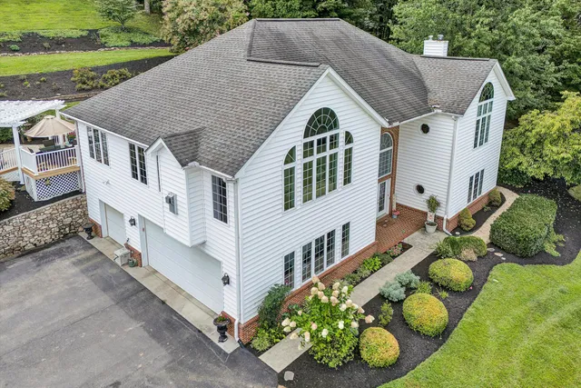 a living room filled with furniture and a window