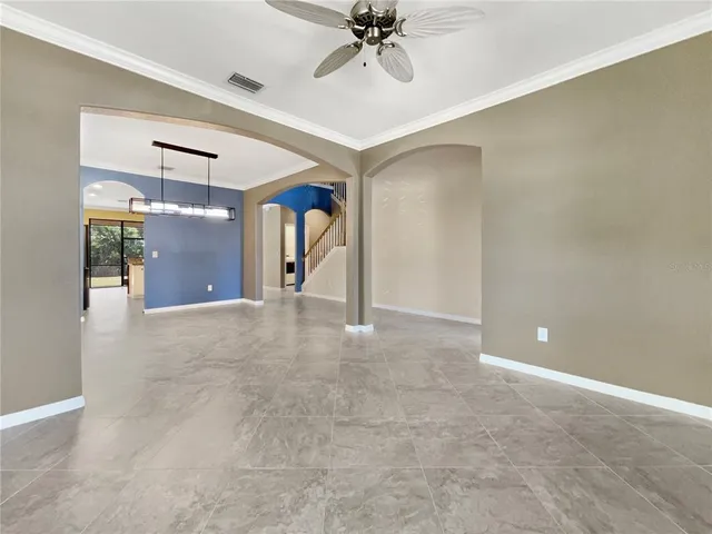 a view of a hallway with a chandelier