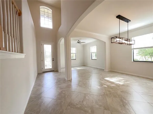 a view of an empty room and window