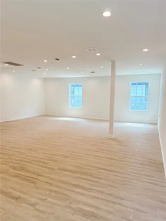 an empty room with windows