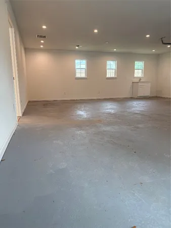 a view of cabinets with wooden floor