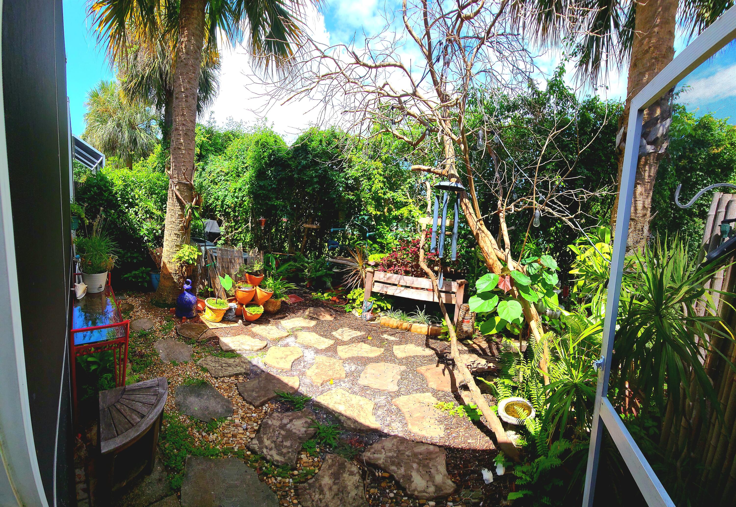 5121 Sabal Gardens Lane, Unit 2 Boca Raton, FL 33487 - Photo 12 of 25 an outdoor space with seating