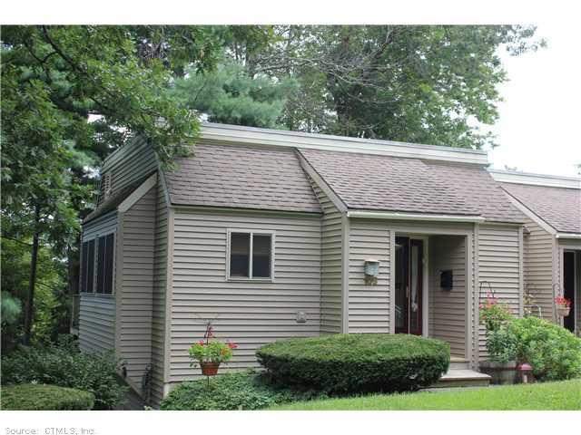 105 Library Lane, Unit 105 Simsbury, CT 06070 - Photo 1 of 1 a view of a house with a yard