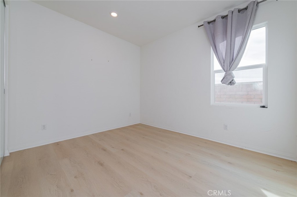 7309 Grazing Lane Riverside, CA 92507 - Photo 11 of 43 an empty room with a window