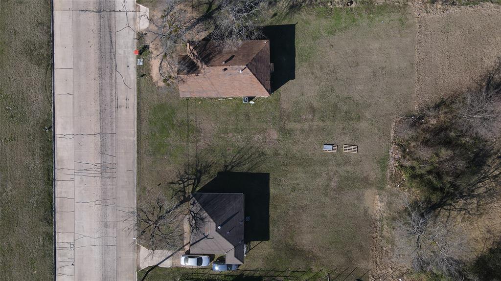 1620 Fitzhugh Avenue Paris, TX 75460 - Photo 15 of 15 a bathroom with a toilet and a shower