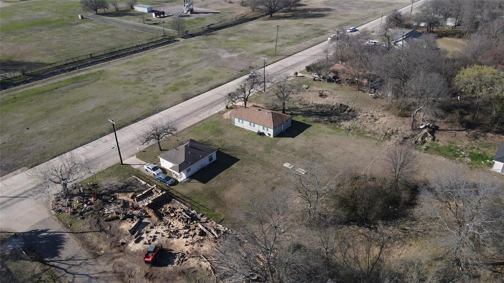 1620 Fitzhugh Avenue Paris, TX 75460 - Photo 8 of 15 a view of a backyard with wooden floor